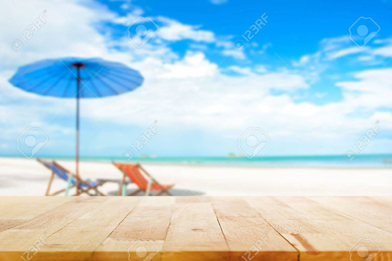 10 Best Beach Background Pictures FULL HD 1080p For PC Desktop 2024 free download wood table top on blur beach background with beach chairs and 800x533