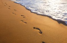 a new take on the old poem, footprints in the sand faith radio