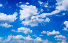 blue sky background with white clouds stock photo, picture and
